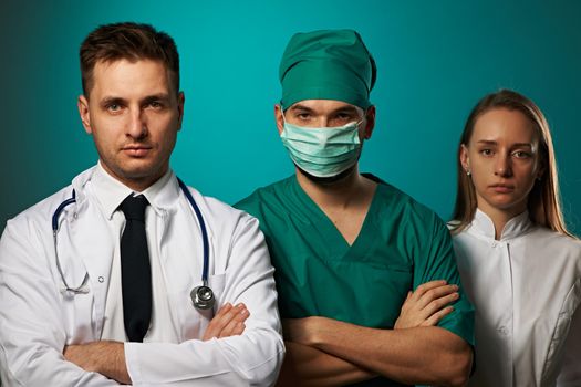Medical team of doctors, two men and woman