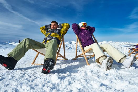 Couple at mountains in winter, Meribel, Alps, France