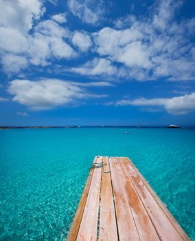 Formentera Ses Illetes beach pier Illetas with Ibiza background at balearic islands