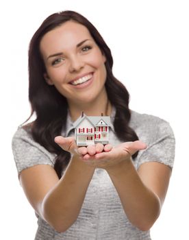 Mixed Race Woman Holding Small House Isolated on White Background - Focus is On The House.