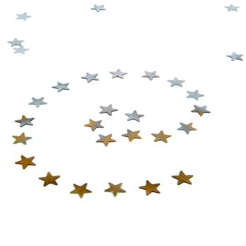 a gold and silver atpersand made of stars on a white background