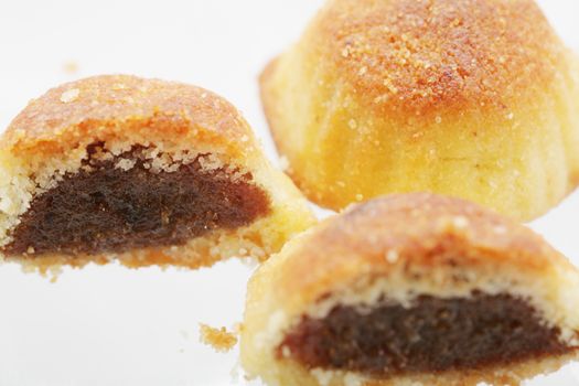 Lebanese Maamoul bi Tamer dessert. Lebanese Typical Easter cookie. Focus in the left cookie.