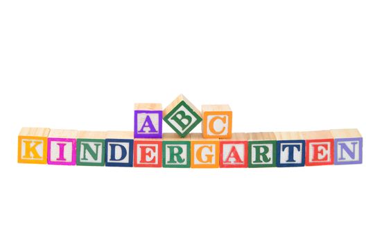 Baby blocks spelling kindergarten. Isolated on a white background.