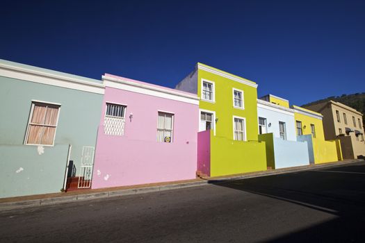 Bo Kaap District Cape Town Western Cape Province South Africa A row of Bright Painted Houses With the Moutains in the Background Very Famous Area in the City Centre and Popular With the Tourist's for Photograph's