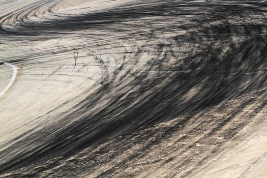 Background with tire marks on road track