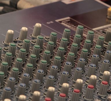 Audio sound mixer console in a recording