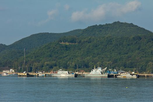 Ship in industrial port and sky landscape