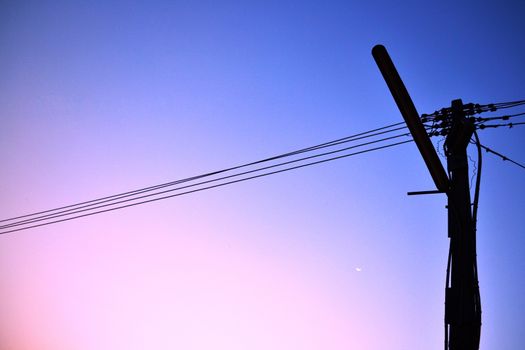 Electric pole on a blue sky