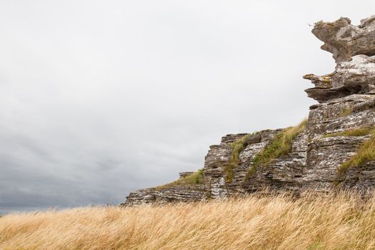 Limestone cliffs on the coastline of Gotland, Sweden. This particular one is called Hoburgsgubben.