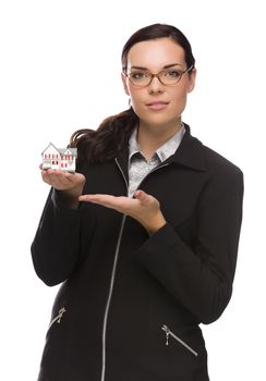 Mixed Race Businesswoman Holding Small House to the Side Isolated on a White Background.
