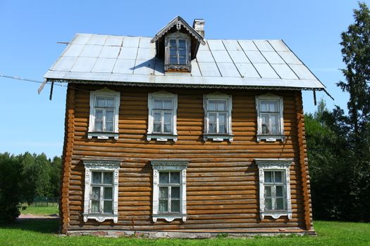 View of the old a log house with an attic