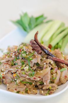 close up of spicy minced pork  served  with  fresh vegetable