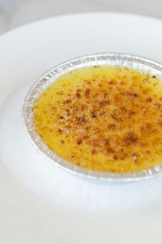 Sweet caramelized custard , French dessert - creme brulee