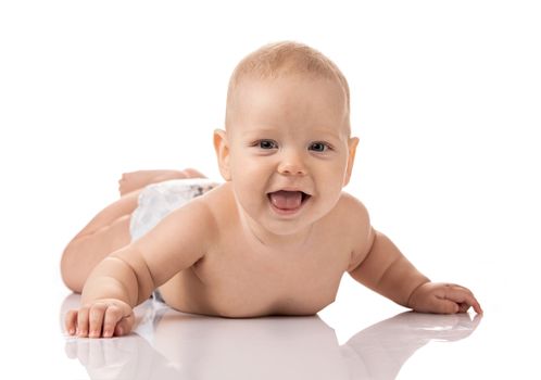 Happy smiling baby boy over white background