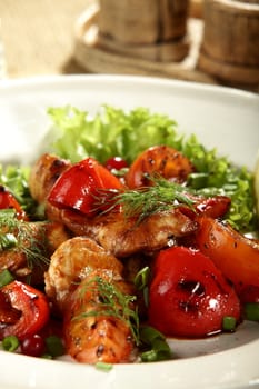 hot meat with pepper on the white dish