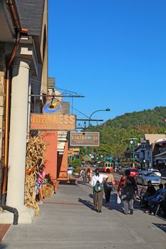 GATLINBURG, TENNESSEE - OCTOBER 5: Tourists and traffic in Gatlinburg, Tennessee on October 5, 2013. Gatlinburg is a major tourist destination and gateway to the Great Smoky Mountains National Park.