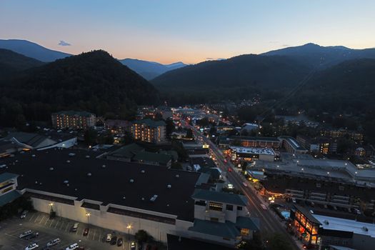 GATLINBURG, TENNESSEE - OCTOBER 5: Aerial night view of Gatlinburg, Tennessee on October 5, 2013. Gatlinburg is a major tourist destination and gateway to the Great Smoky Mountains National Park.