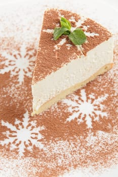 fresh and tasty cake on white dish and white background