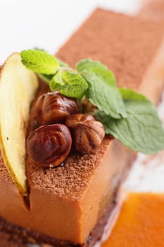 fresh and tasty cake on white dish and white background