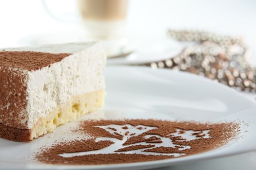 Peace of cake on white dish and white background