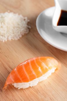 fresh and tasty sushi on bright background