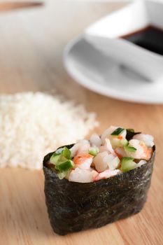 fresh and tasty sushi on bright background