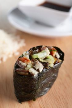 fresh and tasty sushi on bright background