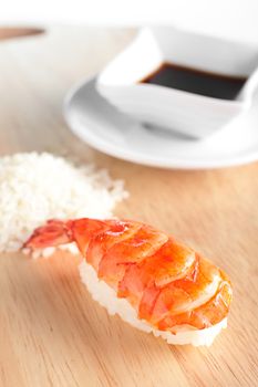 fresh and tasty sushi on bright background