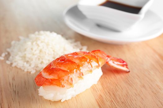 fresh and tasty sushi on bright background