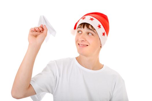 Happy Teenager in Santa's Hat with Paper Plane Isolated On The White Background