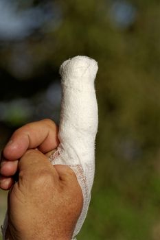 white medicine bandage on injury finger