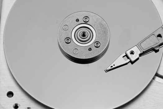 Open computer hard drive on white background in bw color (HDD, Winchester)