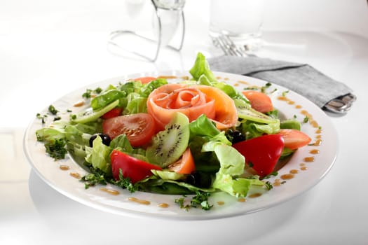 fresh and tasty european salad on white dish