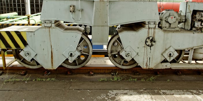 railroad rolling heavy stand (industrial details close up)