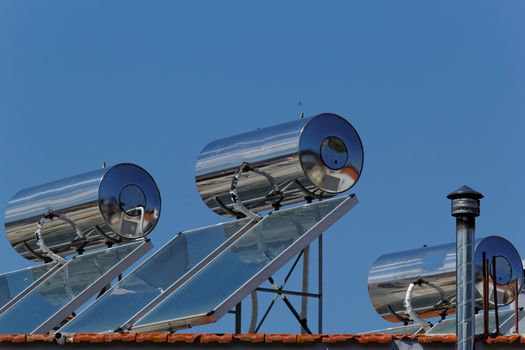 Solar panels on the roof (solar) with water tank