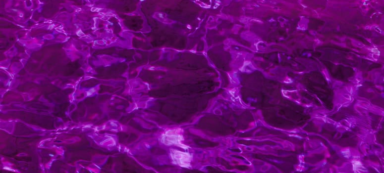 purple abstract background of wavy water surface (lilac)