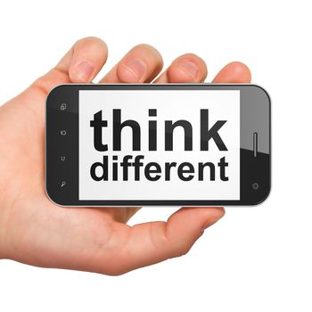 Education concept: hand holding smartphone with word Think Different on display. Generic mobile smart phone in hand on White background.