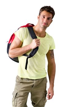 Attractive young man with backpack, isolated on white background, looking at camera