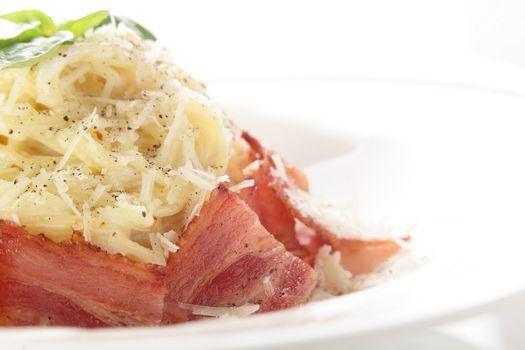 hot and tasty pasta with cheese on white background