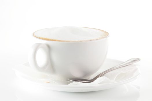 white cup of coffee on white background