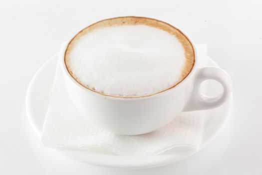 white cup of coffee on white background