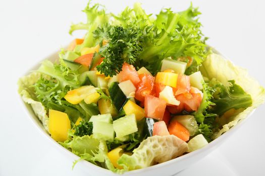 fresh and tasty salad on white background