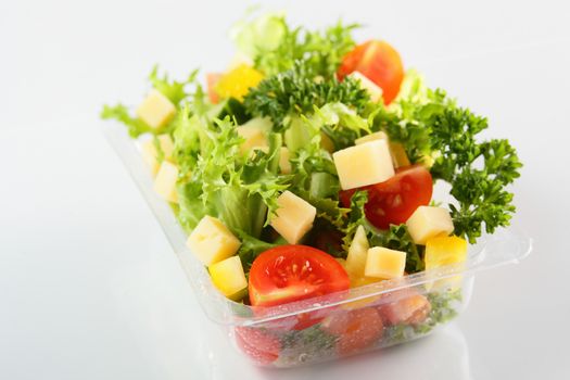 fresh and tasty salad on white background