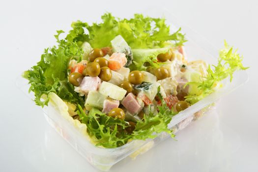 fresh and tasty salad on white background