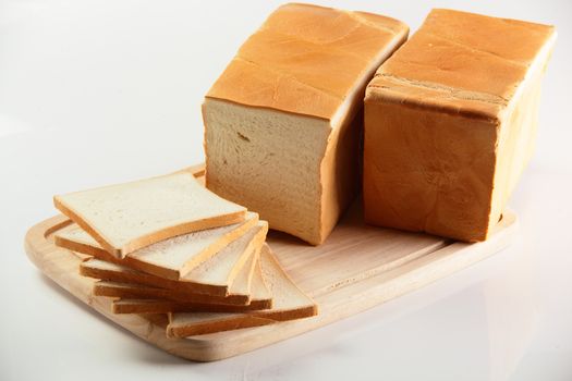 fresh and tasty bread on white background