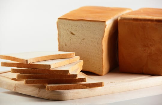 fresh and tasty bread on white background