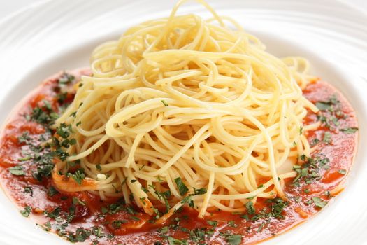 hot fresh and tasty pasta with sauce on white dish