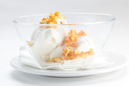 cold and fresh ice cream on transparent dish and white background