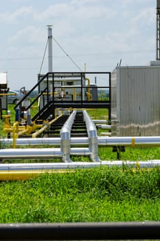 industrial pipes at an oil well