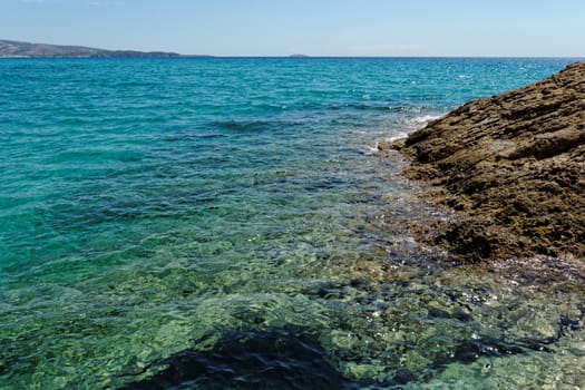 rocky beach with turquise sea on greece thassos island